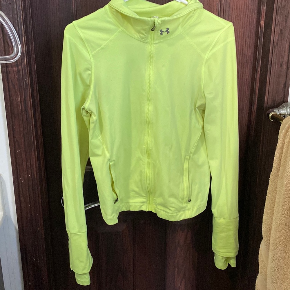 Under Armour green athletic shirt size M.